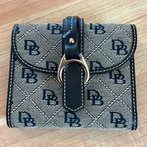 Dooney & Bourke signature fabric wallet with black leather trim.